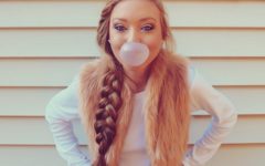 pretty girl blowing a bubble with gum frustrated y the flirting signs guys miss