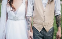 attractive newly wed couple holding hands and listening to marriage tips