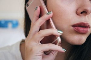 woman on the phone to man she's dating