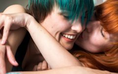 happy lesbian couple laughing after following useful lesbian dating advice