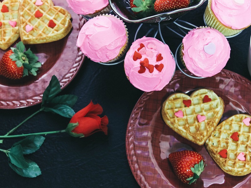 pink cupcakes and heart shaped waffles as an example of the love bombing phenomenon
