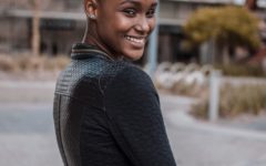 pretty girl looking over her shoulder about to have a conversation