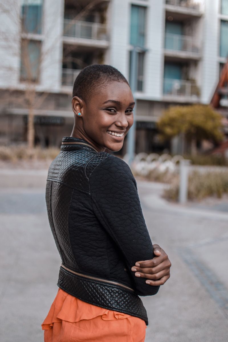 pretty girl looking over her shoulder about to have a conversation