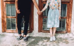 Couple holding hands discussing what women want in a relationship