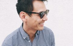 handsome 40-year-old-man smiling with sunglasses on