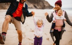 a man walking a man walking on a beach dating a woman with kids