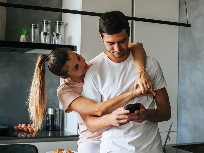 image of amazing young loving couple at the kitchen have a breakfast using mobile phones t20 E4Y6y4 800x600 tinder for couples
