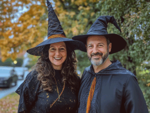 Man and woman dressed as witches.
