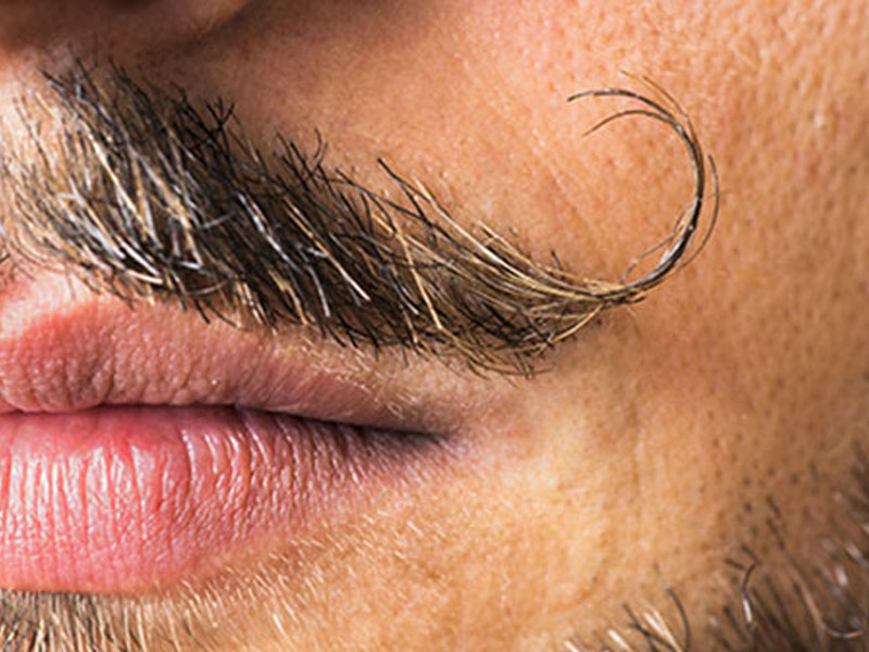 A man with a mustache.