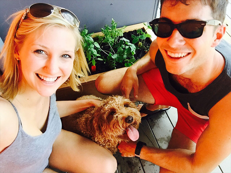A couple with a dog