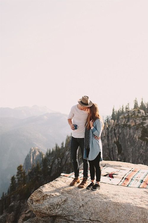 a couple on a mountain