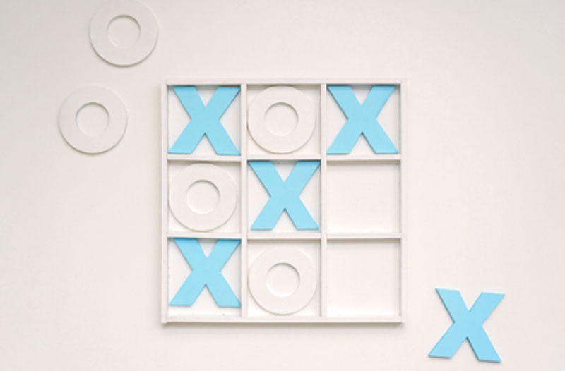 A couple's game of tic tac toe, a fun winter date idea.