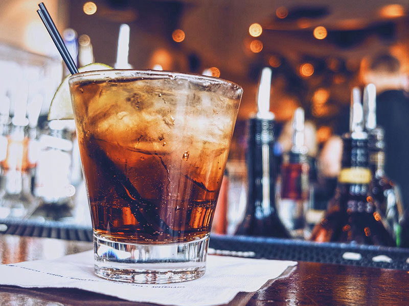 A drink on a bar.