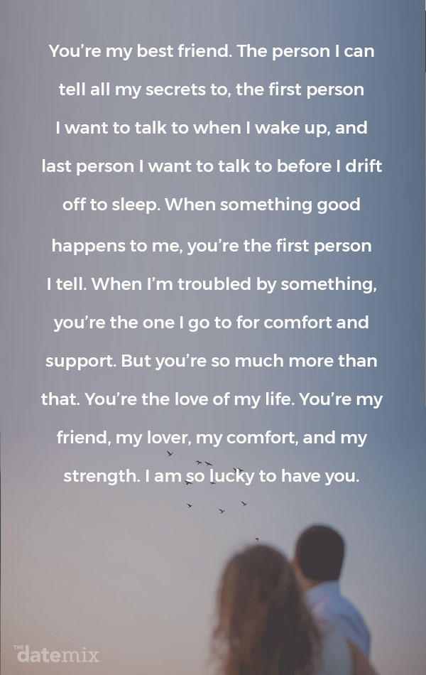 A couple looking at birds flying into the sunset with the love paragraph below spelled out in the sky.