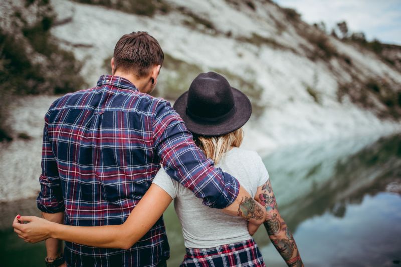 Couple getting back together and walking in the outdoors