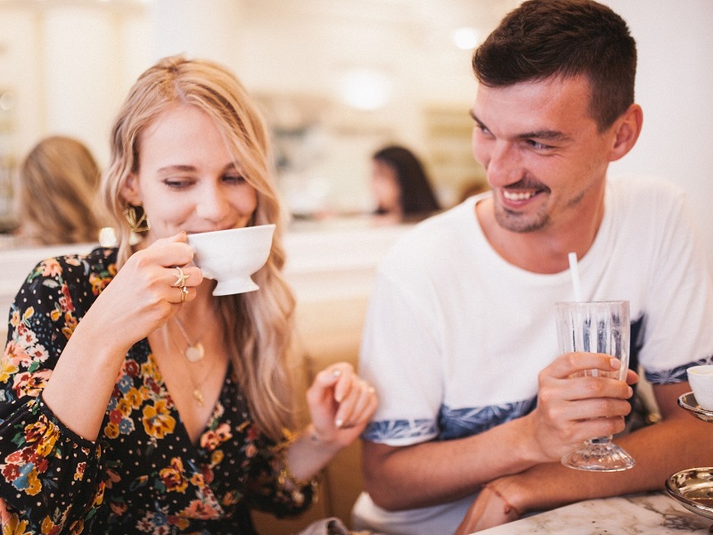Attractive couple enjoying a fun first date conversation