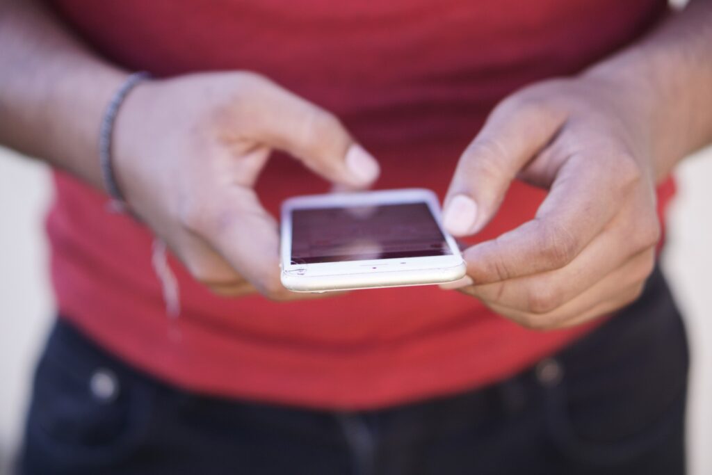single man using his mobile for online dating in Atlanta